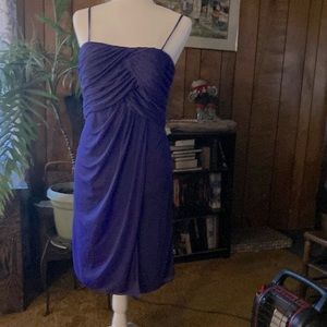 Formal dress with spaghetti straps and chiffon overlay over polyester lining.